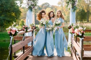 colonial blue bridesmaids dresses at summer wedding